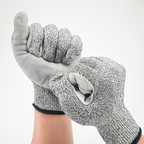 Pair of knit gloves with leather palm patches